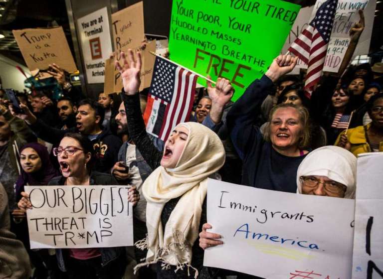 Demonstrators protest against President Donald Trump's executive orders on immigration at George Bush Intercontinental Airport on Sunday, Jan. 29, 2017, in Houston. (Photo by Brett Coomer, Houston Chronicle)